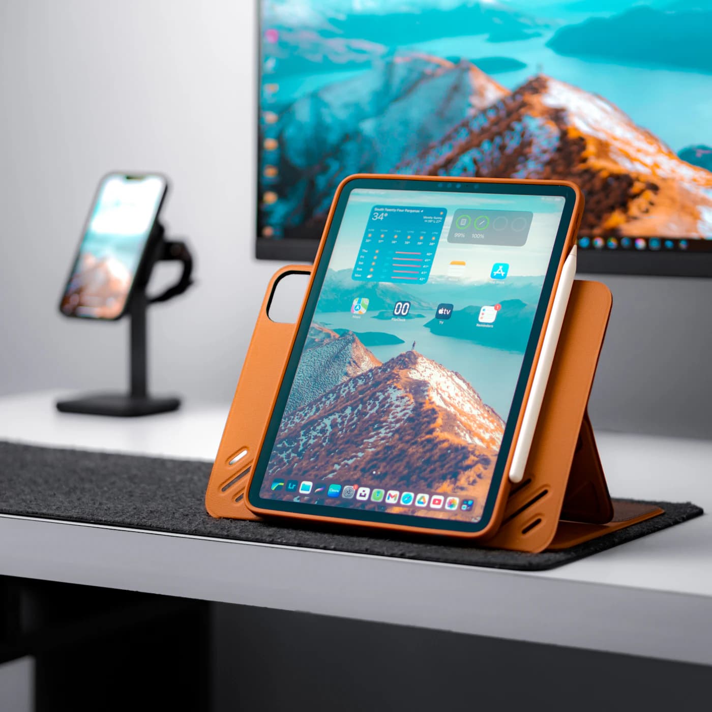 Cell phone and tablet on a desk — illustrative mobile and tablet product-category photograph